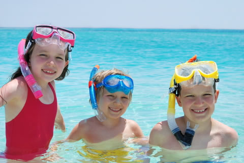 Children snorkelling in the Bahamas